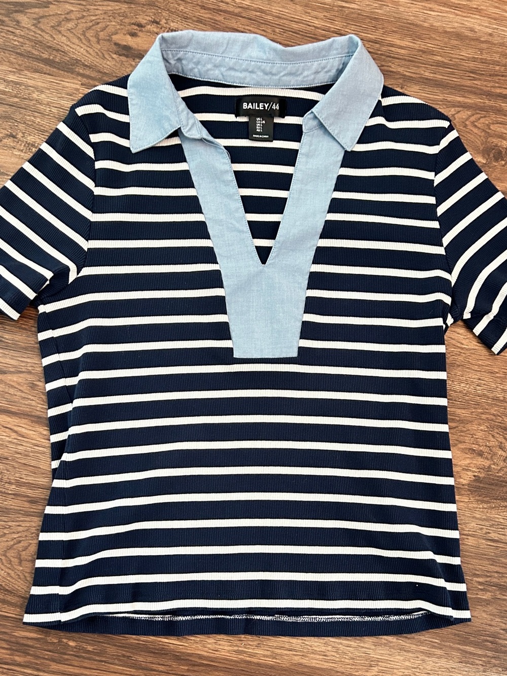 Bailey 44 Navy and White Striped Polo with Light Blue Trim